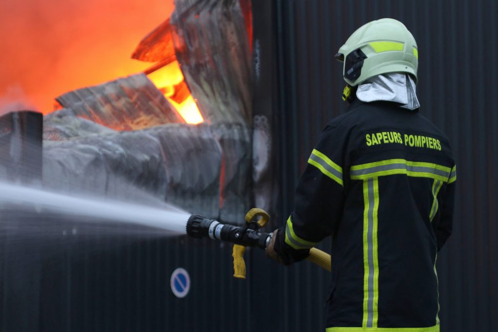 An SDIS17 firefighter fighting a fire in France