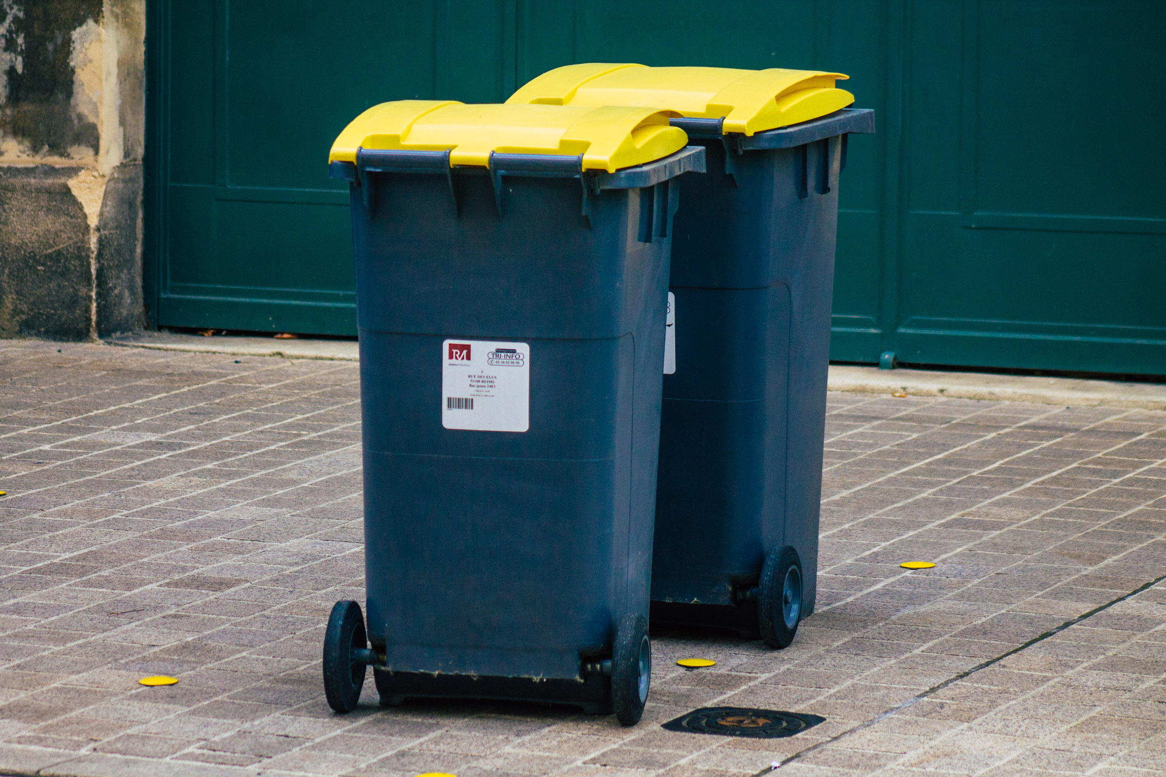 Recycling bins on the pavement in France