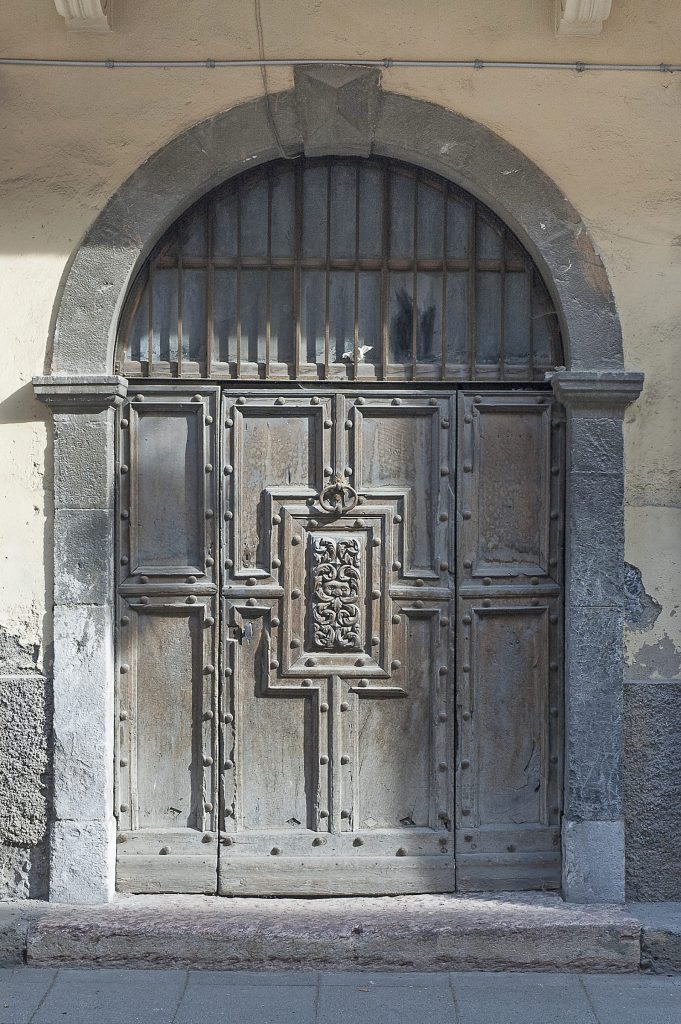 Italianate style door in Jausiers Alps showing regional interpretation of Italian influences