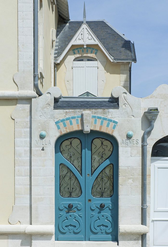 Art Nouveau door in La Rochelle showing characteristic flowing organic forms and decorative ironwork