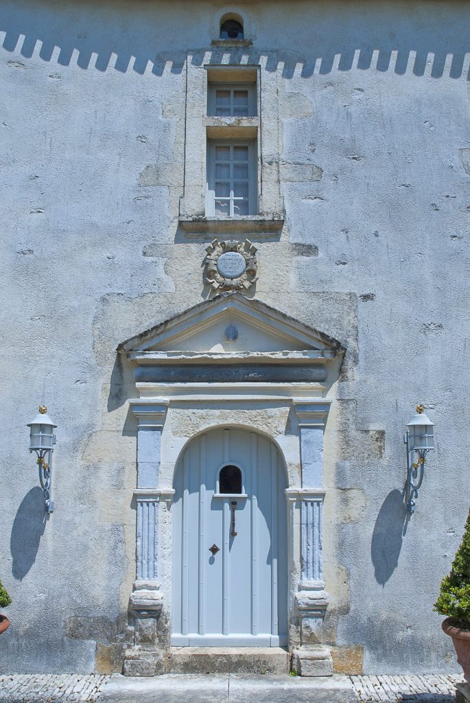 Renaissance door in Thiré in the Vendée showing classical proportions and refined detailing